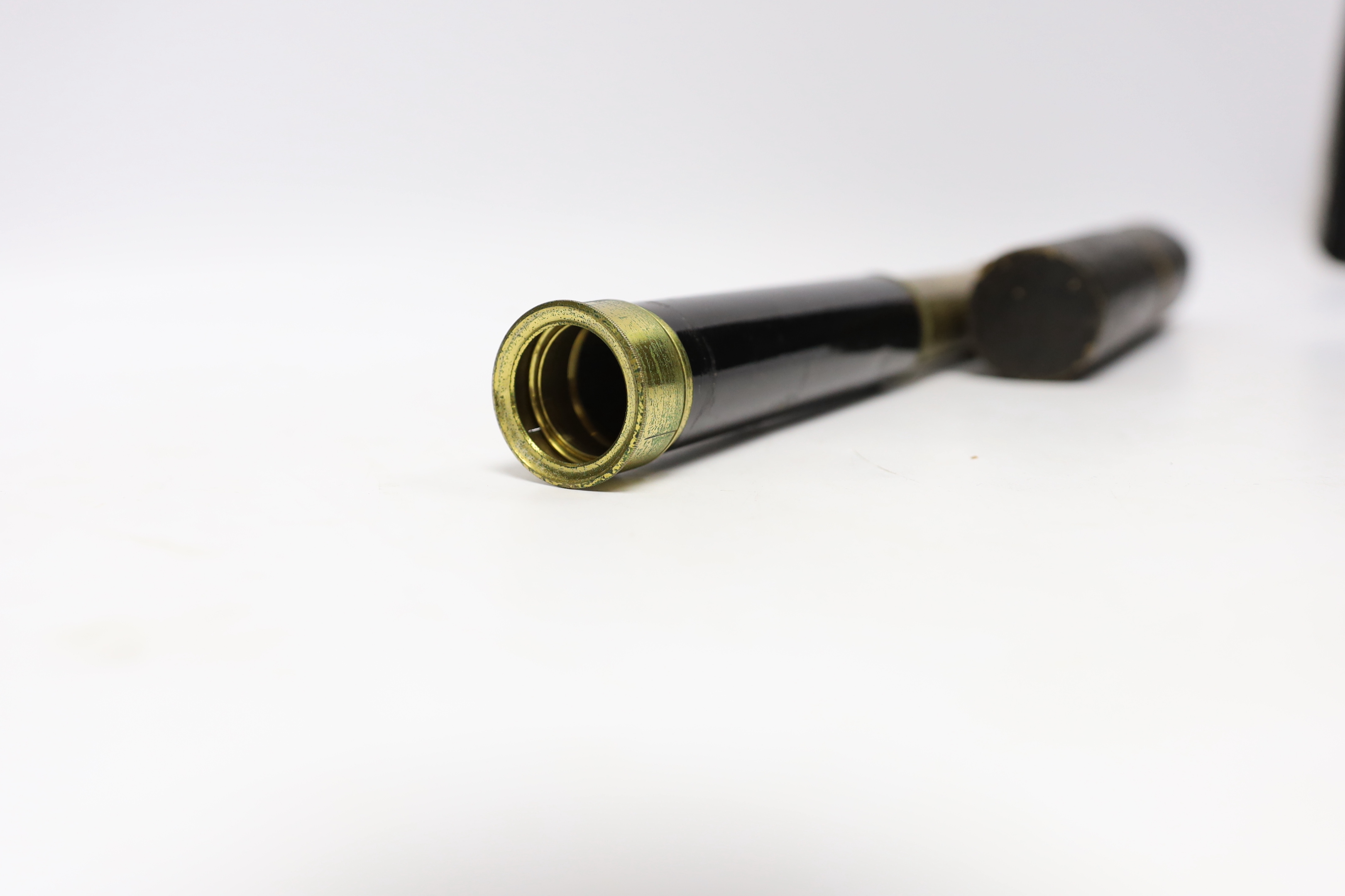 A 19th century P. Carpenter brass kaleidoscope in a card tube, 18cm